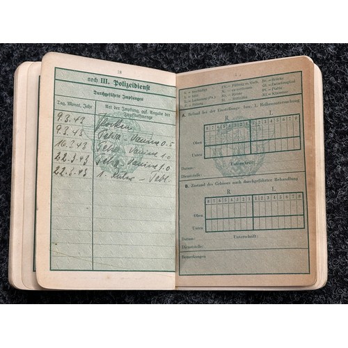 5251 - WW2 Third Reich Polizei Dienstpass to Johannes Rose. Dated 1941 with entries to 1944. Complete with ... 