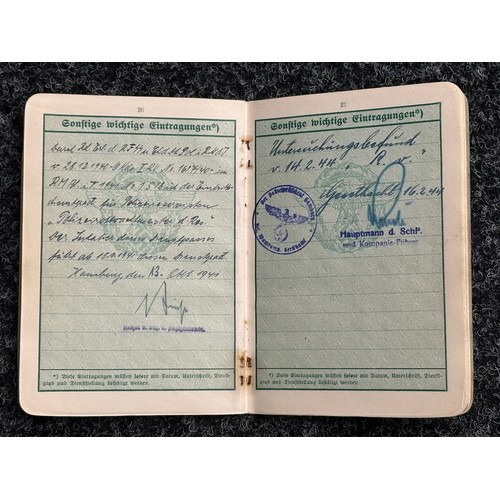 5251 - WW2 Third Reich Polizei Dienstpass to Johannes Rose. Dated 1941 with entries to 1944. Complete with ... 