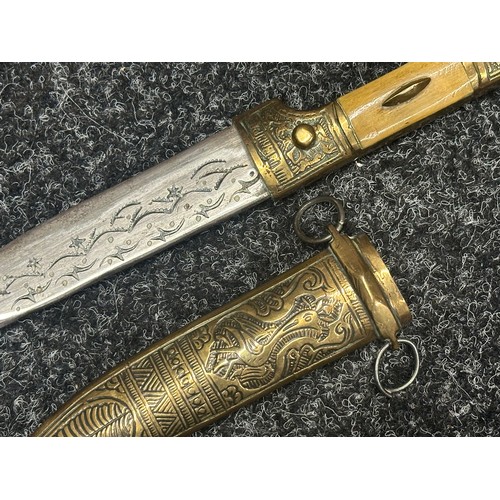 5274 - Two Middle Eastern Jambiya Daggers. Each made of brass and with inlaid Horn grips. Both with curved ... 