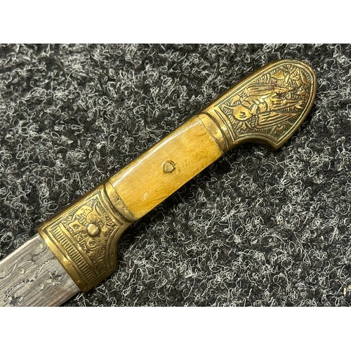 5274 - Two Middle Eastern Jambiya Daggers. Each made of brass and with inlaid Horn grips. Both with curved ... 