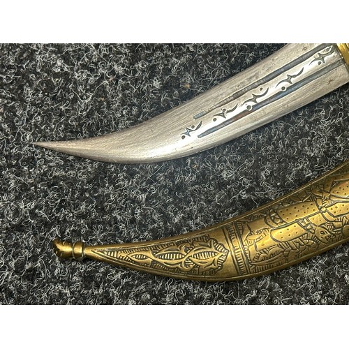 5274 - Two Middle Eastern Jambiya Daggers. Each made of brass and with inlaid Horn grips. Both with curved ... 