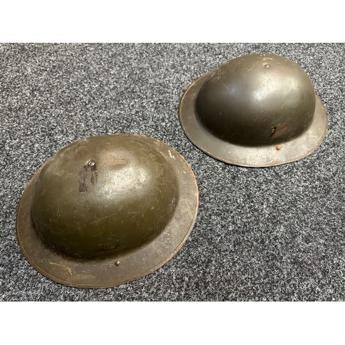 5310 - Two Belgian Post War British Pattern Steel Helmets. Complete with liners and chinstraps. National Co... 