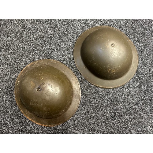 5310 - Two Belgian Post War British Pattern Steel Helmets. Complete with liners and chinstraps. National Co... 