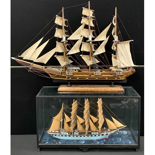 199 - A scratch built model of a four mast tall ship, glass case, 36cm high x 64cm wide x 18.5cm deep;  an... 