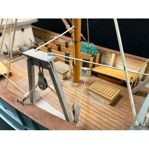 200 - A Static wooden hand built model of a Trawler boat, pale blue, number 476, 83cm long, 44cm high