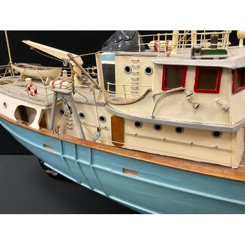 200 - A Static wooden hand built model of a Trawler boat, pale blue, number 476, 83cm long, 44cm high