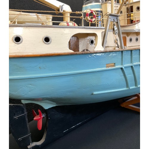 200 - A Static wooden hand built model of a Trawler boat, pale blue, number 476, 83cm long, 44cm high