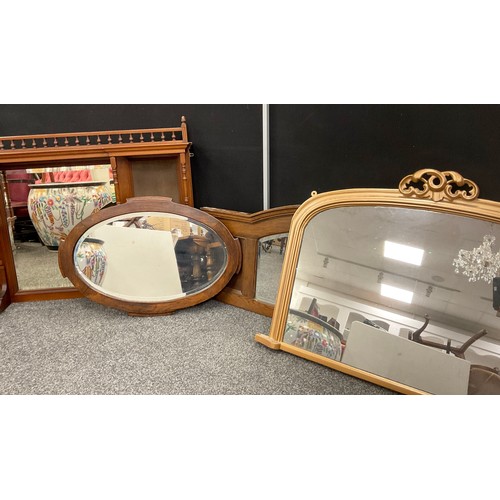 205A - A late Victorian mahogany over-mantel mirror, 84cm high x 127cm wide;  another gold-painted arch-top... 