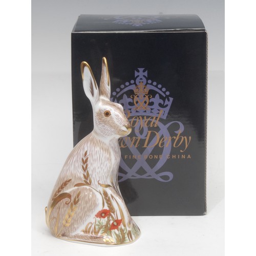 3105 - A Royal Crown Derby paperweight, Midsummer Hare, gold stopper, 16.5cm high, printed mark in red, box... 