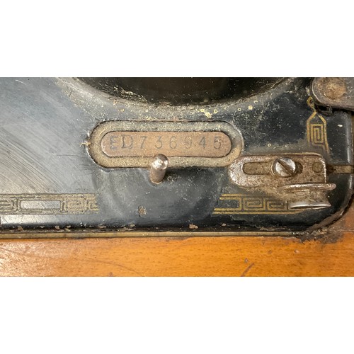 56 - Singer electric sewing machine, REG ‘ED736045’, with pedal