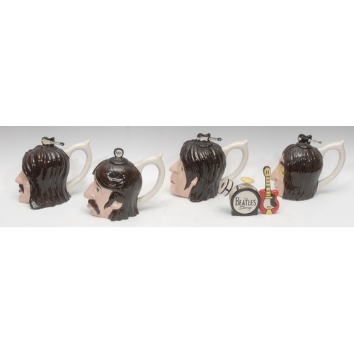 4060 - A set of four Lorna Bailey novelty teapots, The Beatles Story, including John, Paul, George and Ring... 