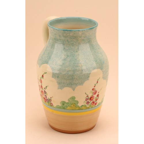 4000 - A Clarice Cliff Isis jug or vase, painted with stylised pink flowers under a mottled blue sky, 25cm ... 