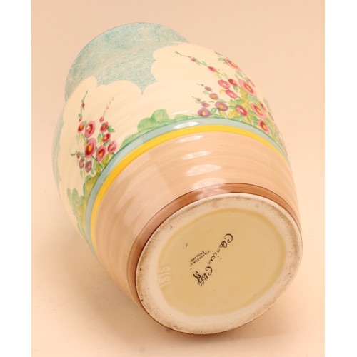 4000 - A Clarice Cliff Isis jug or vase, painted with stylised pink flowers under a mottled blue sky, 25cm ... 