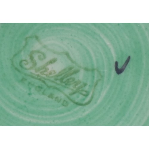 4116 - A Shelley Harmony Art Ware ginger jar and cover, painted with bands and dribbled colours in tones of... 