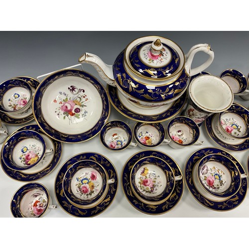 6294 - A 19th century English tea service for eight, painted to the central reserves with a floral arrangem... 