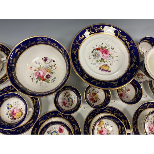 6294 - A 19th century English tea service for eight, painted to the central reserves with a floral arrangem... 