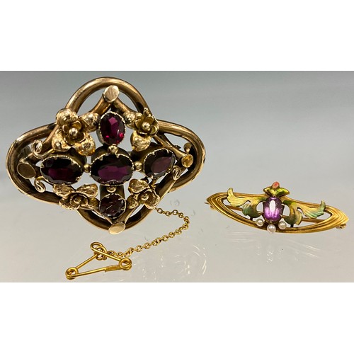 6268 - An Art Nouveau enamelled pale amethyst and seed pearl brooch, oval amethyst beneath three seed pearl... 