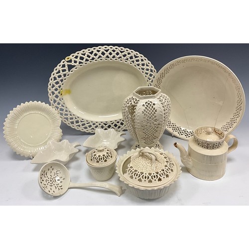 6300 - A collection of Leeds Pottery creamware including a reticulated hexagonal vase, of shouldered and fo... 