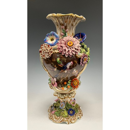 6298 - A Coalbrookdale pedestal vase, everted gilt rim above two panels hand-painted with still life and ex... 