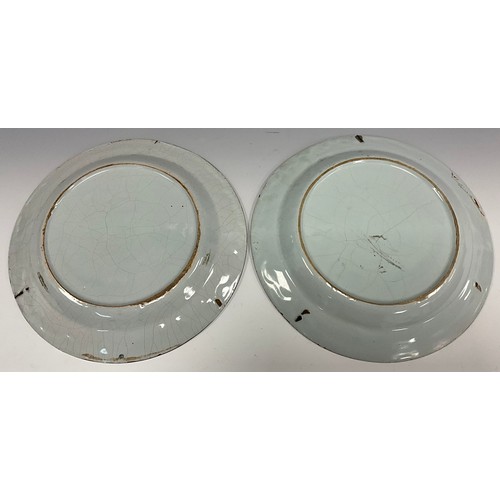 6305 - A pair of 18th century English Bristol Pottery Delft plates, hand-painted Shepherd and Shepherdess p... 