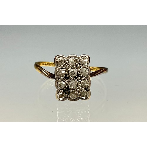 6261 - An Art Deco 18ct gold and platinum diamond rectangular panel cluster ring, set with twelve old Europ... 