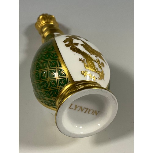 6301 - A Lynton porcelain baluster scent bottle, decorated with alternating panels of gilt with birds among... 