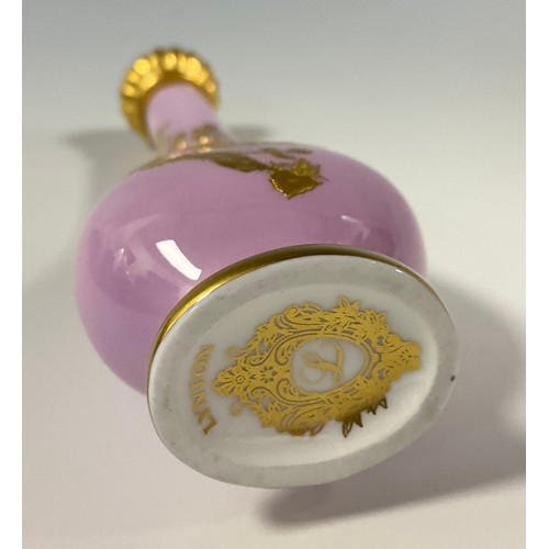 6303 - A Lynton porcelain tear-shaped scent bottle, decorated in gilt with birds among blossoming prunus on... 