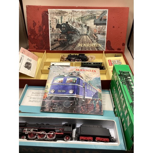 3066 - A Märklin HO steam locomotive train set, model Railway interest vintage boxed pieces boxed; a Markli... 