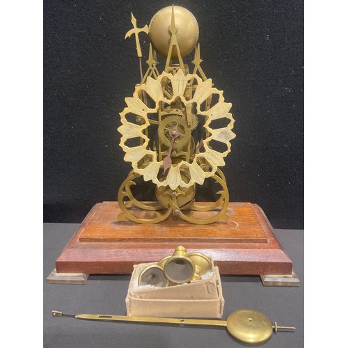 A gothic design architectural brass skeleton clock, for restoration
