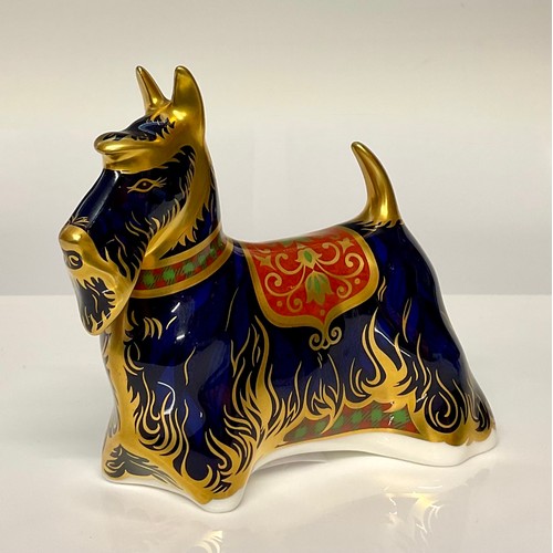 3158 - A Royal Crown Derby paperweight, Scottish Terrier, gold stopper, 13cm long, printed mark in red