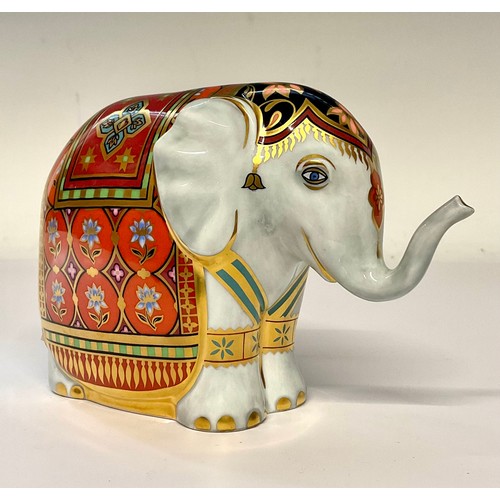 3128 - A Royal Crown Derby paperweight, Mulberry Hall Baby Elephant, exclusive to Mulberry Hall of York, li... 