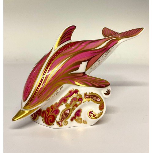 3142 - A Royal Crown Derby paperweight, Pink Dolphin, a limited edition of 150, gold stopper, 15cm long, pr... 