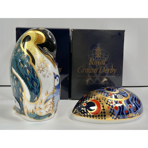 3139 - A Royal Crown Derby paperweight, Penguin and Chick, gold stopper, 13cm, printed mark, boxed; another... 