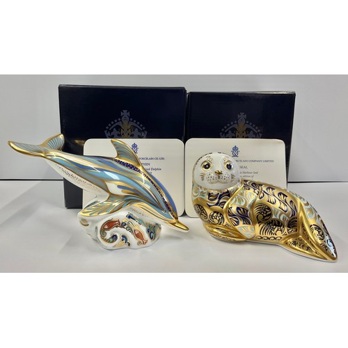 3171 - A Royal Crown Derby paperweight, Striped Dolphin, specially commissioned by Connaught House, limited... 