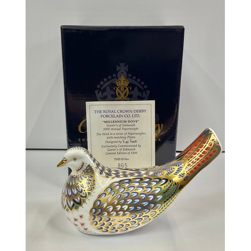 3121 - A Royal Crown Derby paperweight, Millennium Dove, exclusively commissioned by Goviers of Sidmouth, d... 