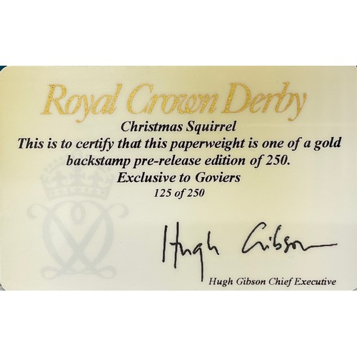 3055 - A Royal Crown Derby paperweight, Christmas Hedgehog, gold stopper, 9cm, printed mark in grey, boxed;... 