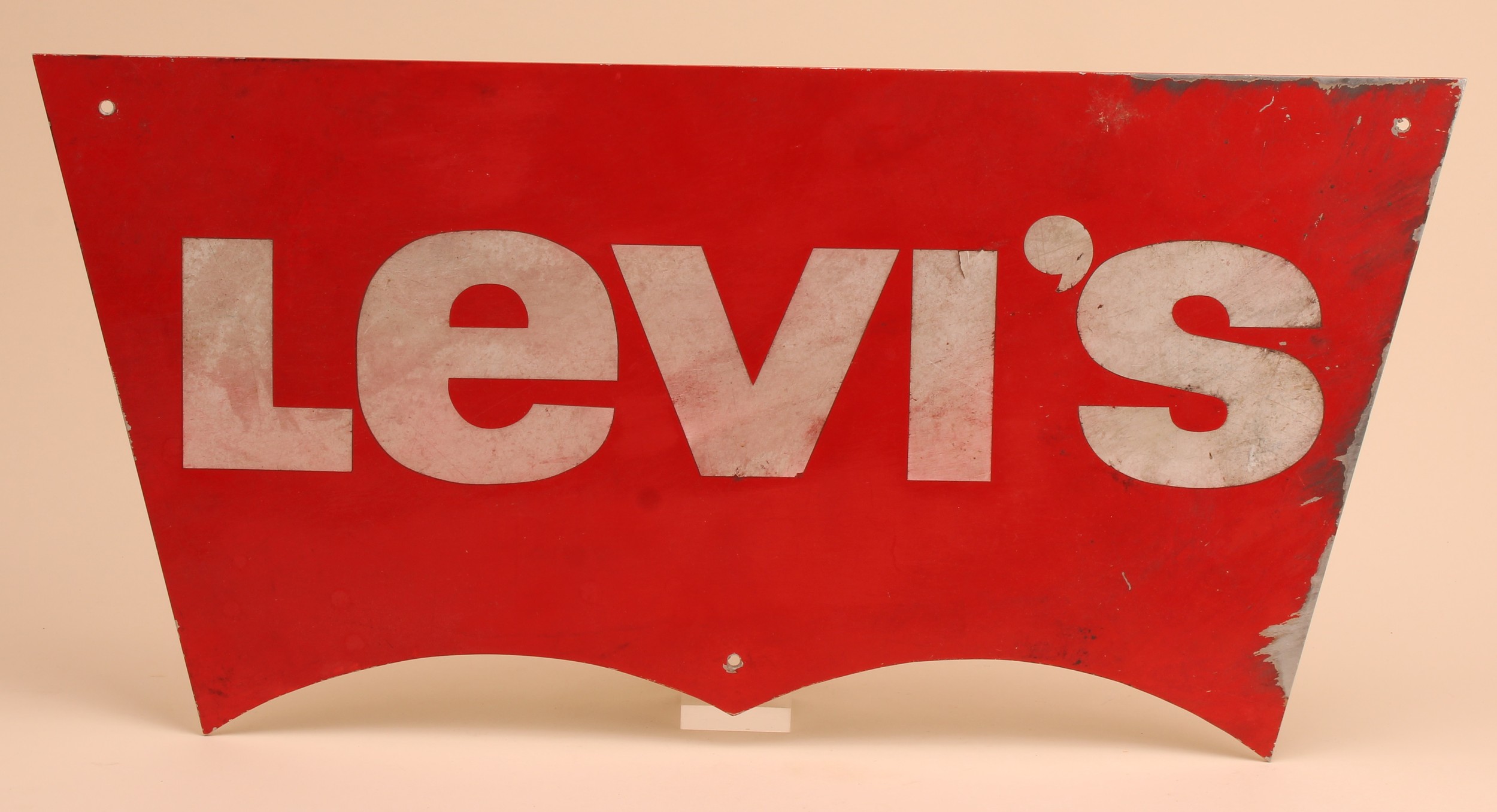 Advertising - a late 20th century aluminium sign, Levi's, inscribed in ...