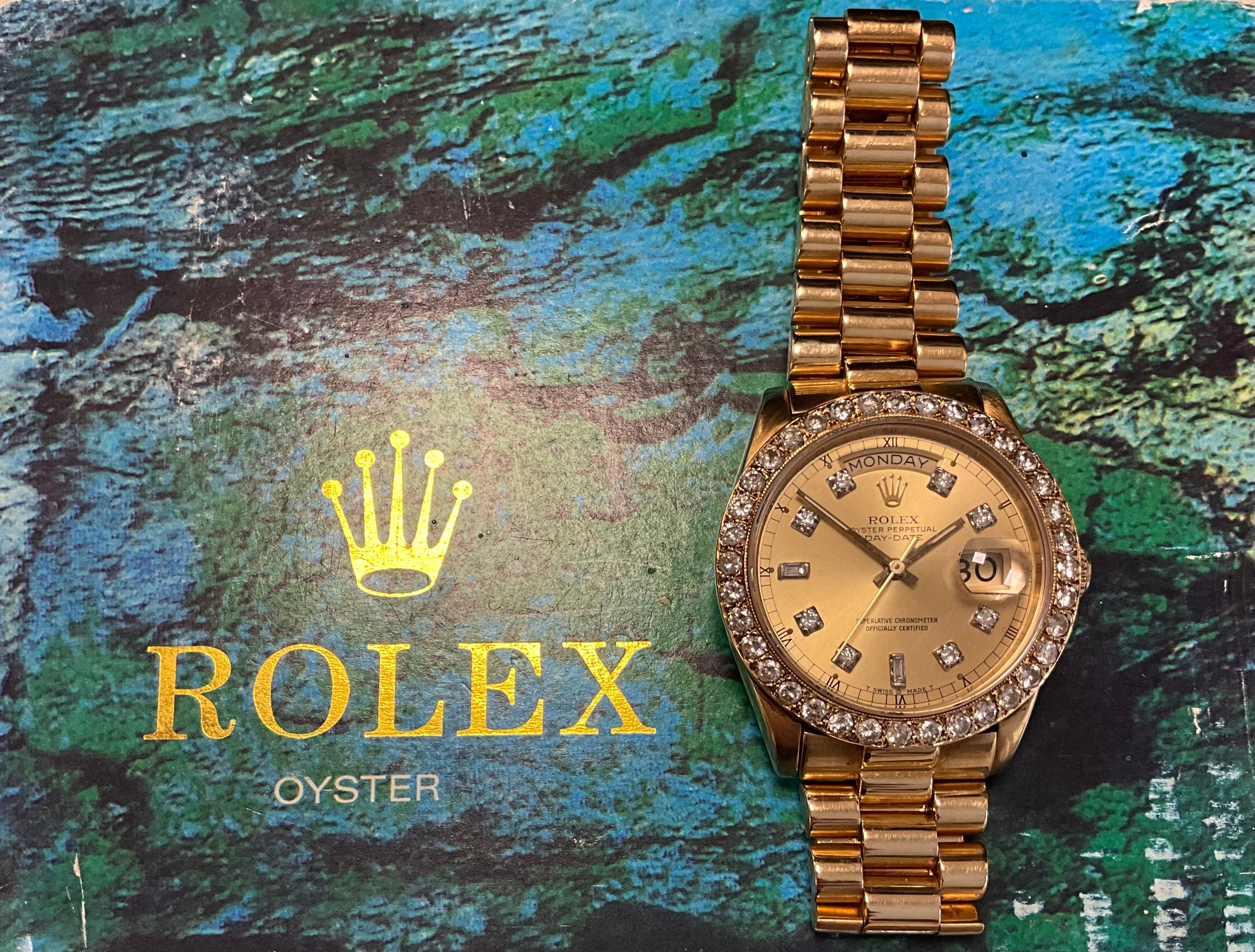 Rolex - an Oyster Perpetual Day-Date 18ct gold diamond accented ...
