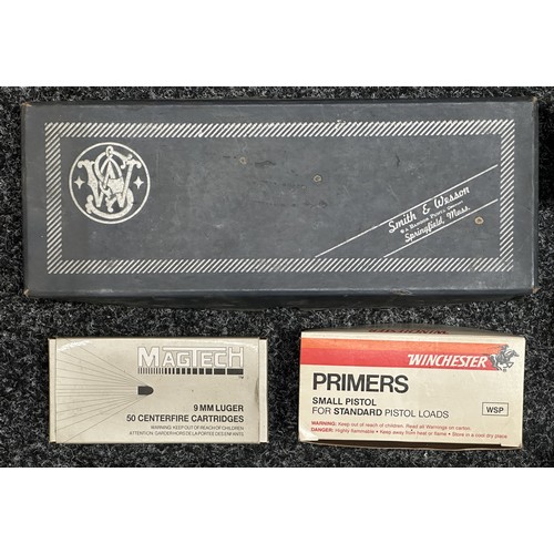 5369 - A collection of empty cardboard and plastic ammunition and primer boxes including a box for a Smith ... 