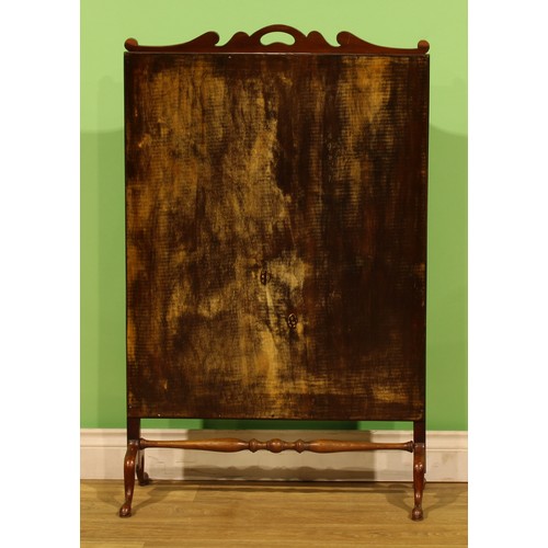 An early 20th century mahogany and beech fire screen, woolwork banner ...