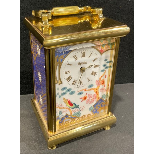 A Spode lacquered brass carriage clock, applied with three decorative ...