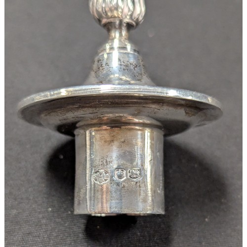 5042 - A silver two branch candlestick, detachable sconces, central cover with flame finial, 36cm, Walker &... 