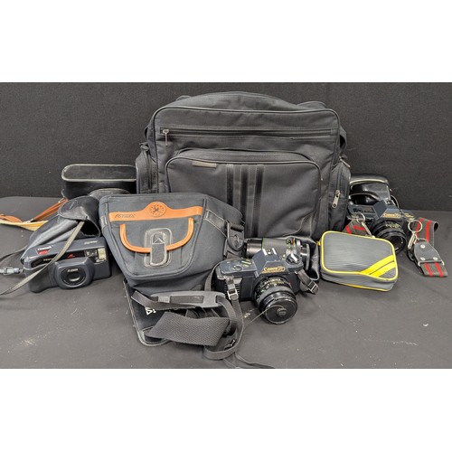 13 - Cameras and camera accessories - 35mm photography - a Canon T70 SLR with canon 50mm f/1.8 lens;  Can... 