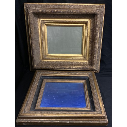 12 - A late 19th/early 20th century ornate gilt wood and gesso picture frame, approx 51cm x 46cm overall,... 