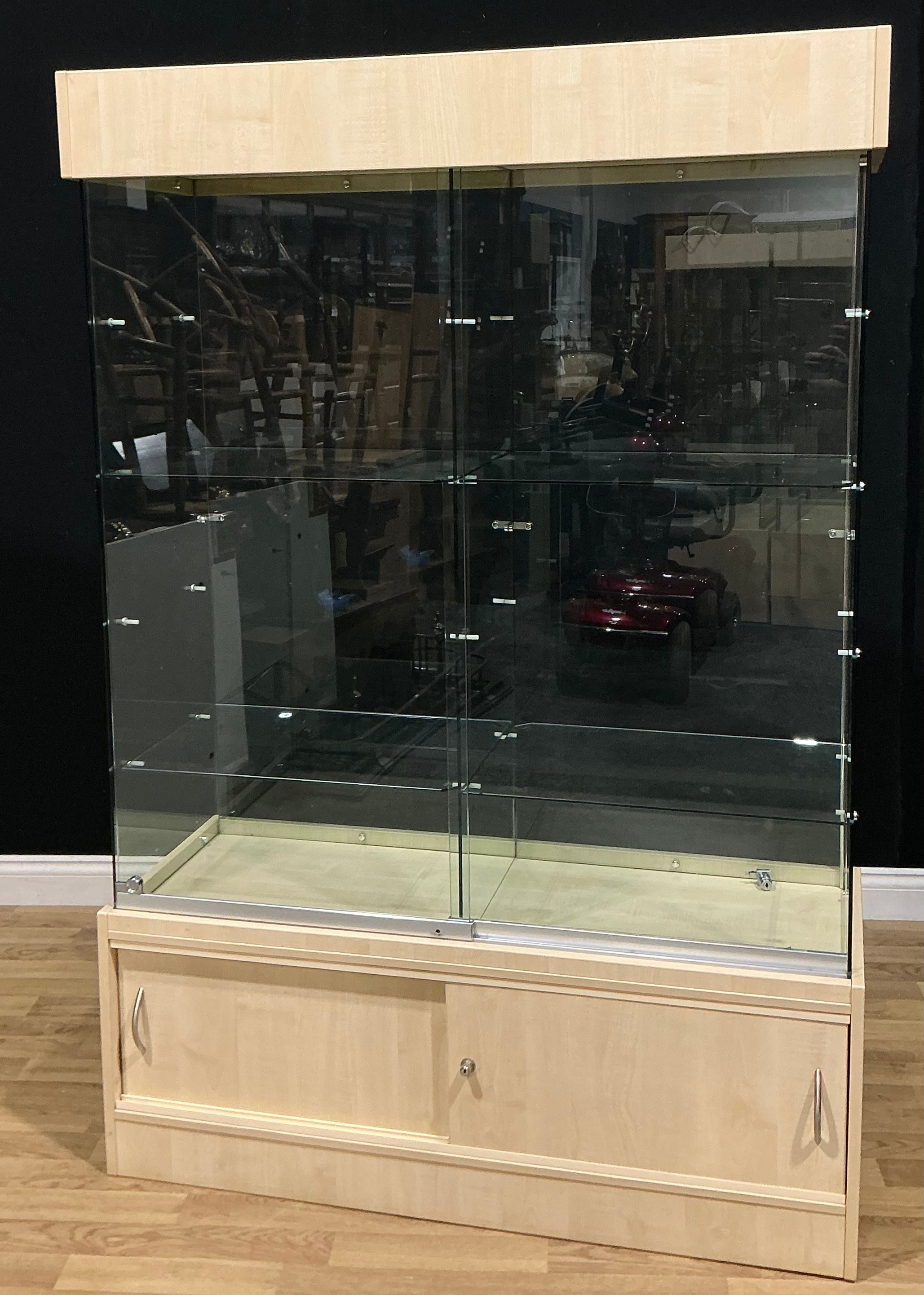 A contemporary shop display case, 179cm high, 120.5cm wide, 47cm deep