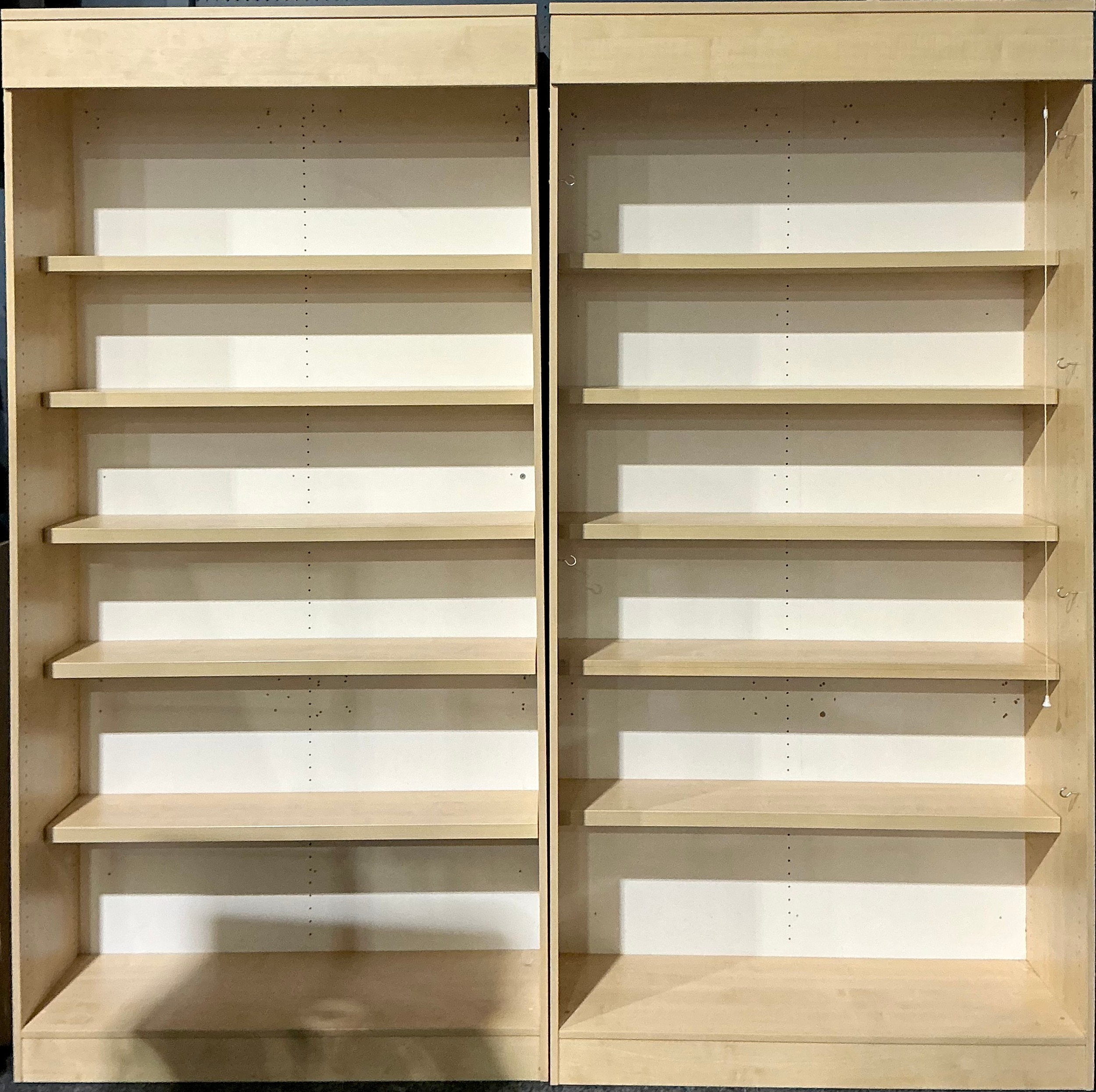 A pair of contemporary open bookcases or shop display cases, each 241cm ...