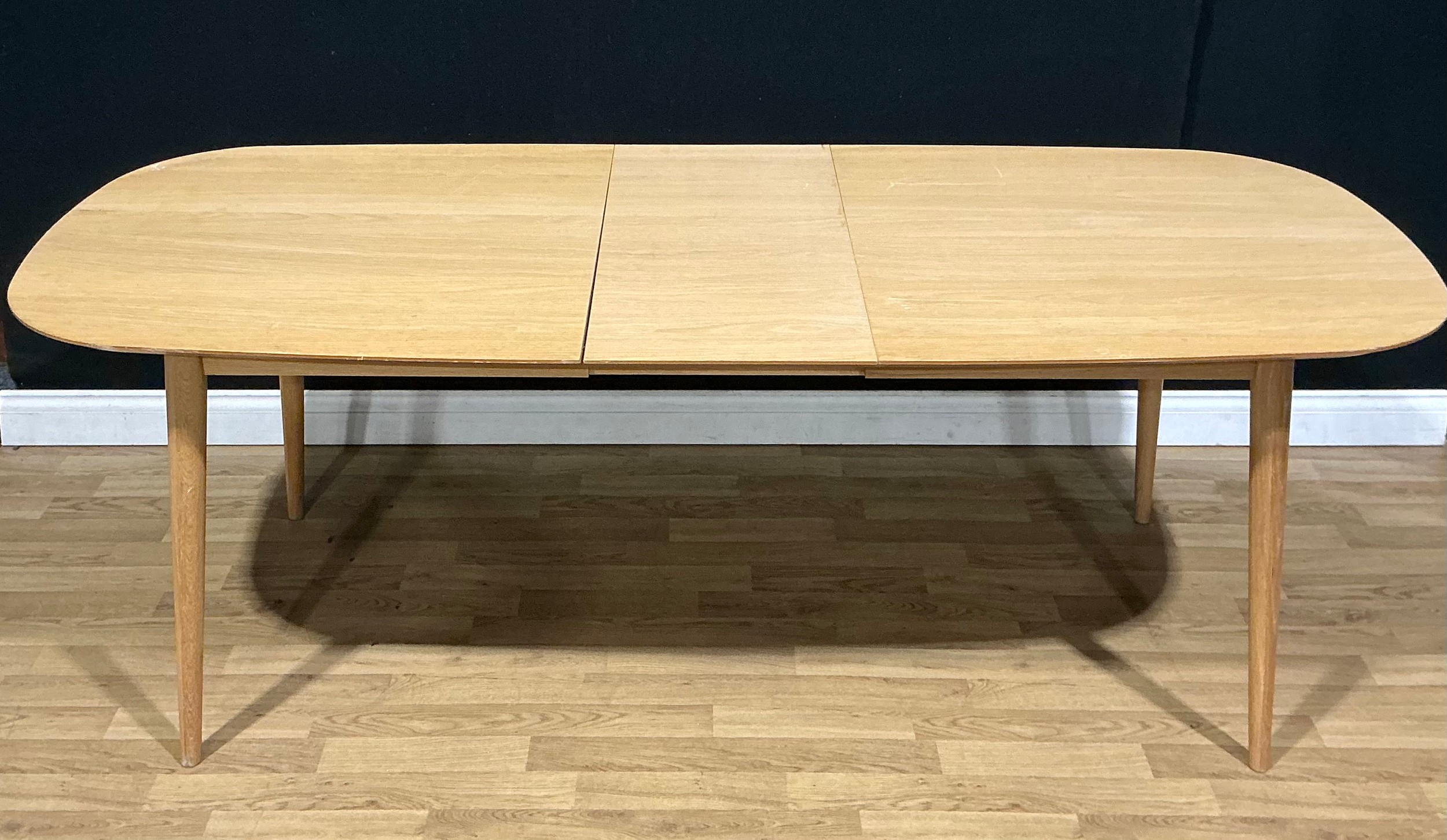 A contemporary Ercol style extending dining table, 76.5cm high, 215.5cm ...