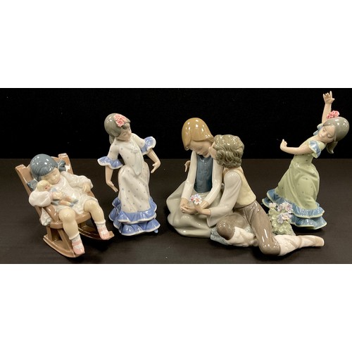19 - A group of four Lladro figures including, Dlamenco dancer, model 5193, designed by Juan Huerta, anot... 