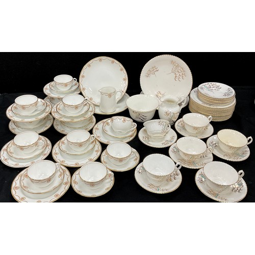 66 - An early 20th century tea set, decorated with roses and ribbon swags comprised of, two picnic plates... 