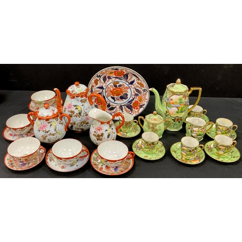 68 - Japanese egg shell tea set including a three piece Kutani egg shell, a lime green coffee set includi... 